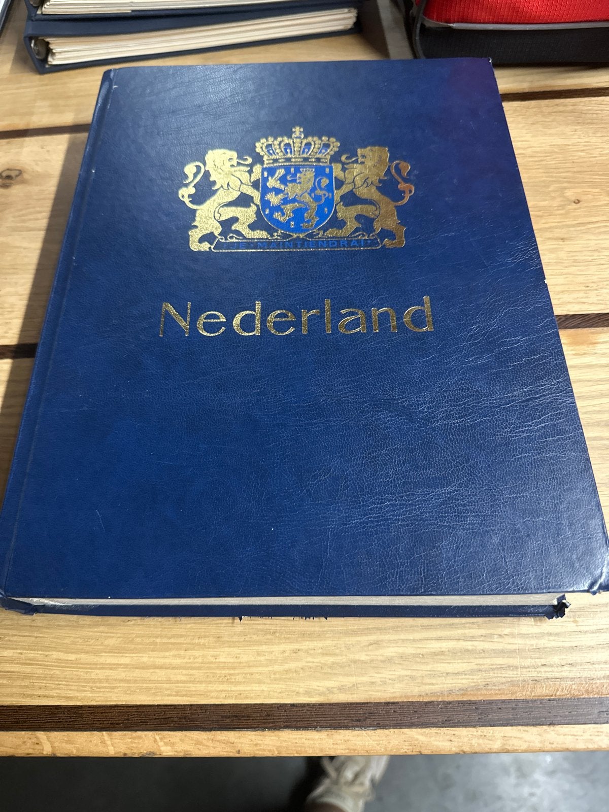 Leeg postzegel album verzamel 'Nederland' - Blauw met wapen, Postzegels en Munten, Postzegels | Toebehoren, Ophalen of Verzenden