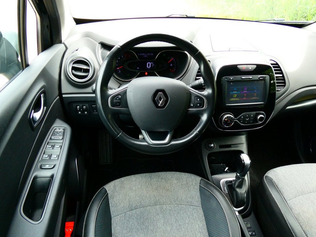 Renault Captur 1.2 TCe 120pk Automaat 2e eig. Clima Navi Tre, Auto's, Renault, Gebruikt, 4 cilinders, 635 kg, Leder en Stof