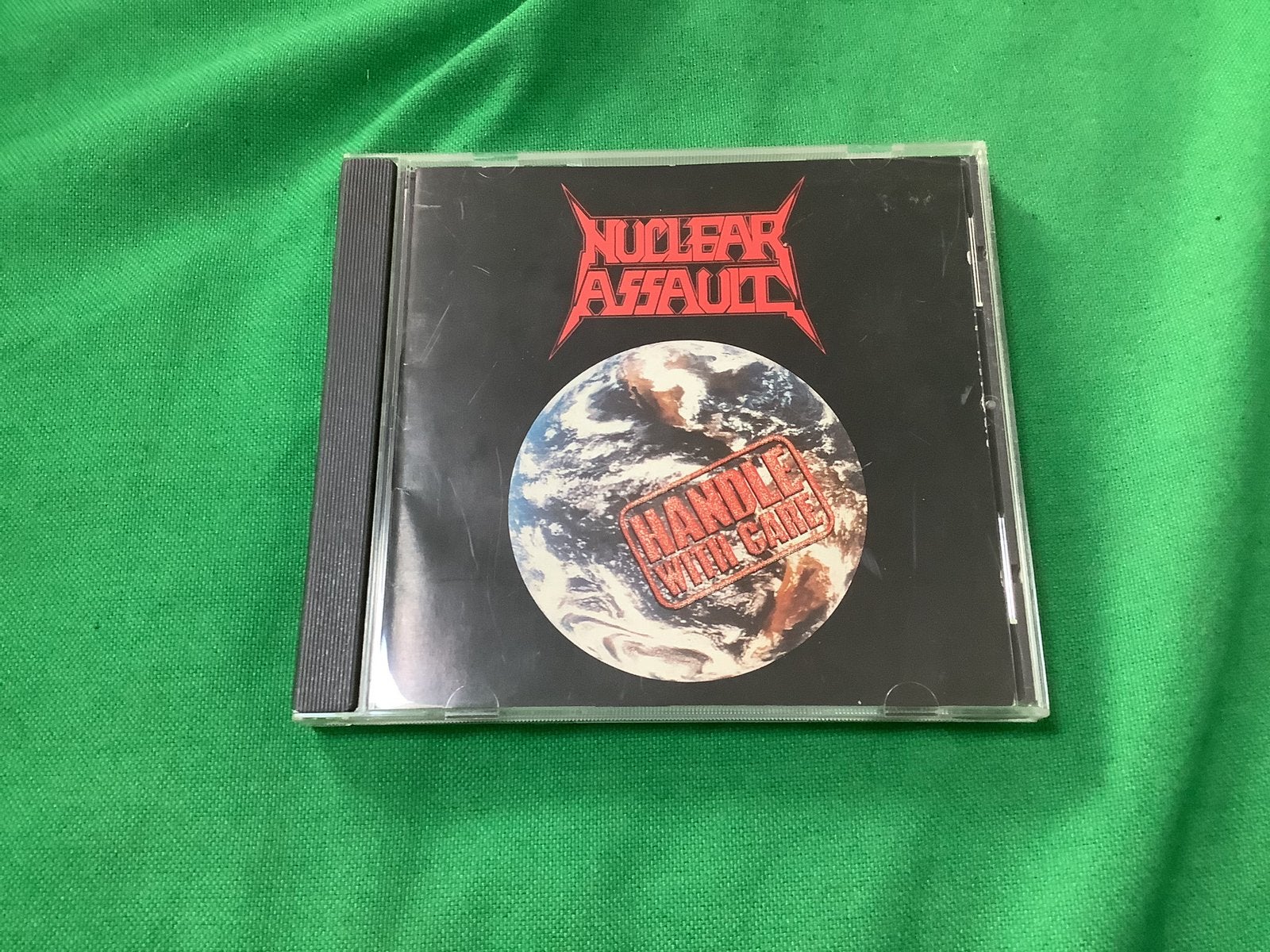 Nuclear Assault-Handle With Care cd (UK), Ophalen of Verzenden, Gebruikt