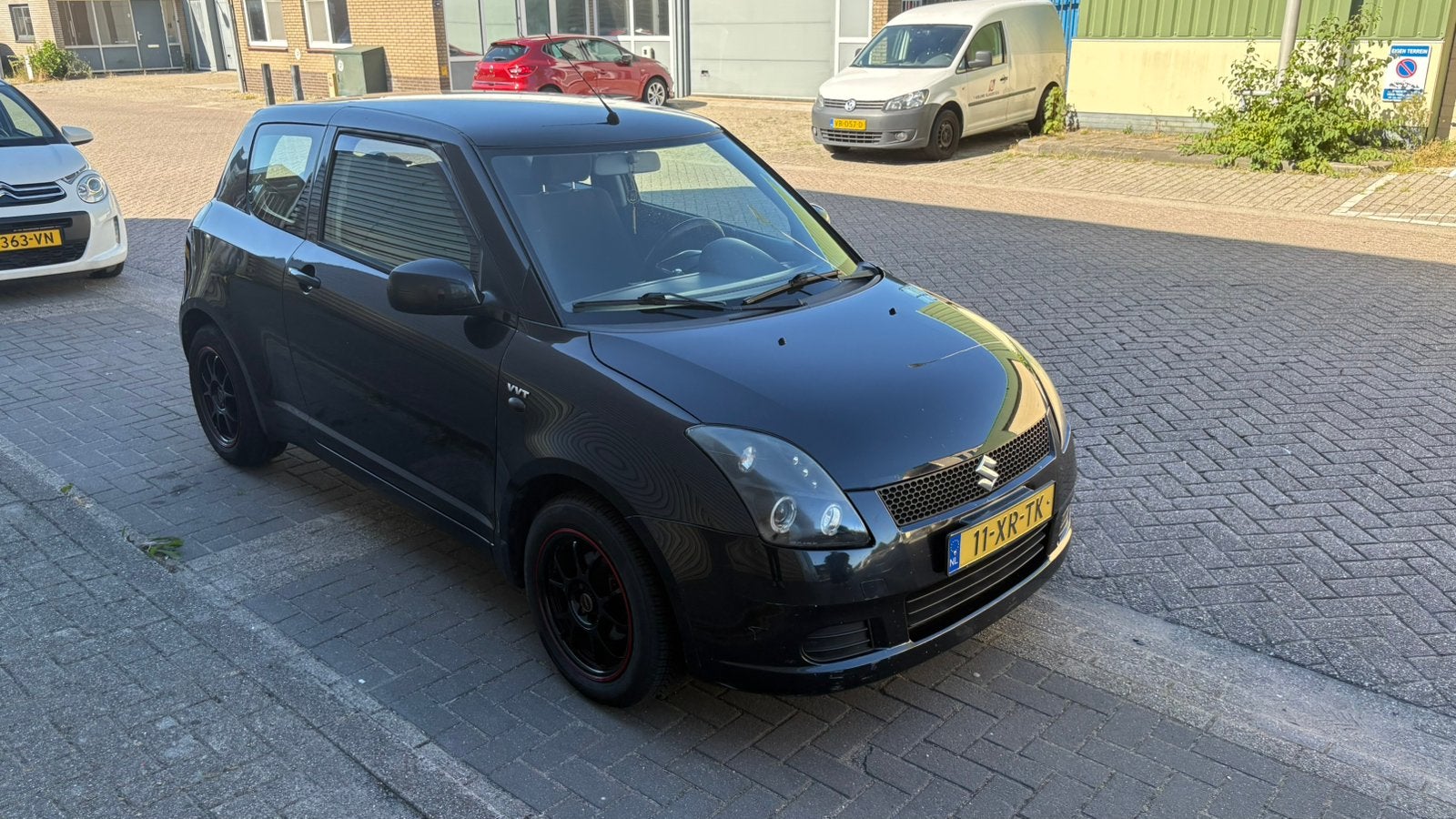 Suzuki Swift 1.3 3D 2007 Zwart, Auto's, Stof, Origineel Nederlands, Handgeschakeld, 1000 kg