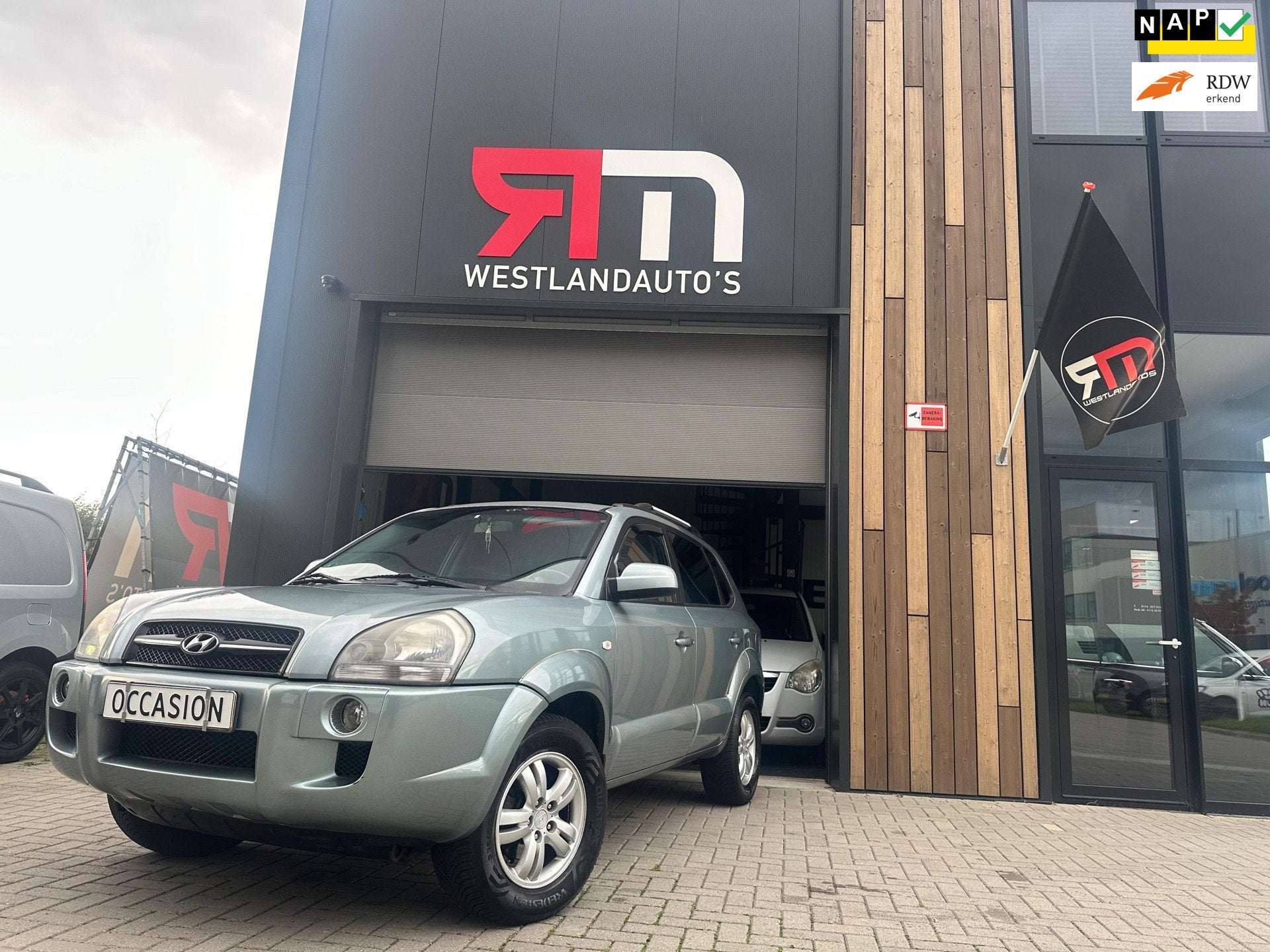 Hyundai Tucson 2.0i Style/navi/clima/parking-sensoren/NW APK, Auto's, Dealer onderhouden, Stof, Zwart, 4 cilinders