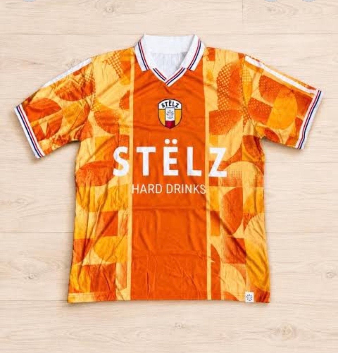 4 Stelz Oranje shirts L-XL - Ook los te koop, Maat 52/54 (L), Nieuw, Oranje, Ophalen of Verzenden
