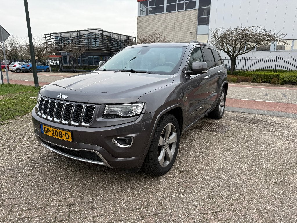 Jeep Grand Cherokee 3.0 CRD V6 184KW AUT 2014 Grijs, Auto's, Jeep, Euro 5, 2987 cc, Leder, Bedrijf