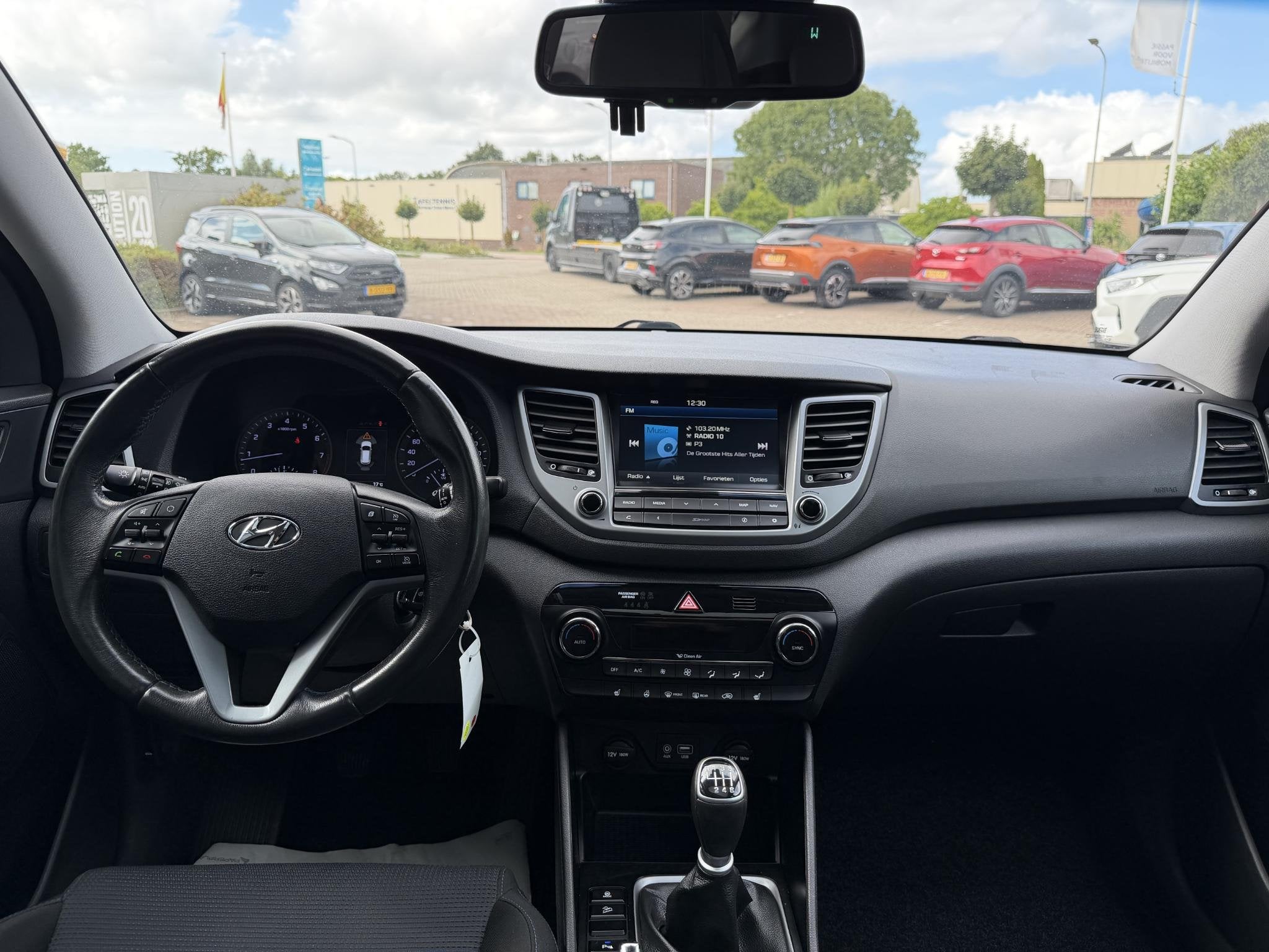 Hyundai Tucson 1.6 T-GDi Comfort PANORAMADAK | CAMERA | TREK, Auto's, Stof, Gebruikt, 4 cilinders, Wit