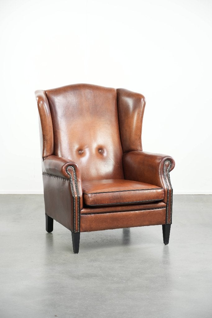 Schapenleren oorfauteuil in een warme cognac kleur, Huis en Inrichting, Ophalen, Gebruikt, Vintage, /