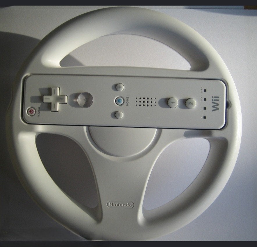 Te koop aangeboden: een witte Nintendo Wii  compleet, Gebruikt, Racen en Vliegen, 2 spelers, Ophalen of Verzenden