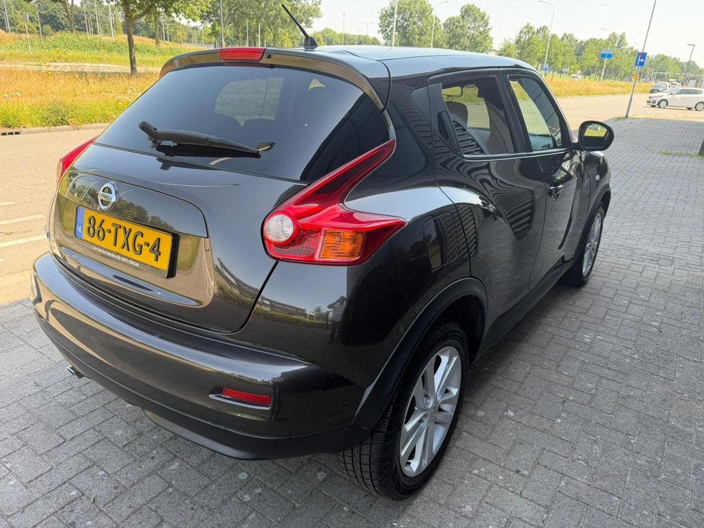 Nissan Juke 1.6 Tekna, Auto's, Nissan, Euro 5, 4 cilinders, Bruin, SUV of Terreinwagen