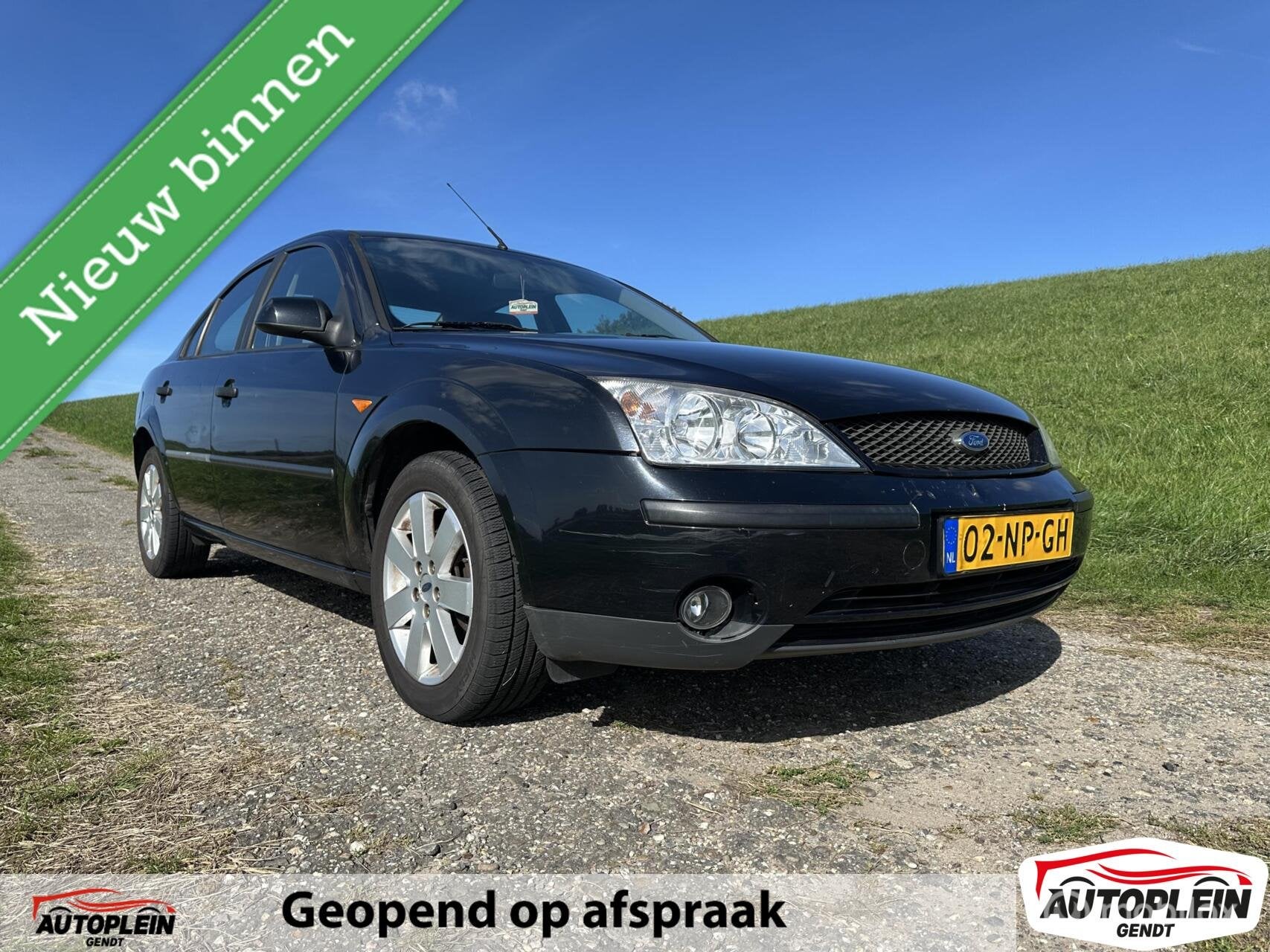 Ford Mondeo 1.8-16V Ambiente IJskoude airco!, Auto's, Gebruikt, 4 cilinders, Mondeo, Zwart