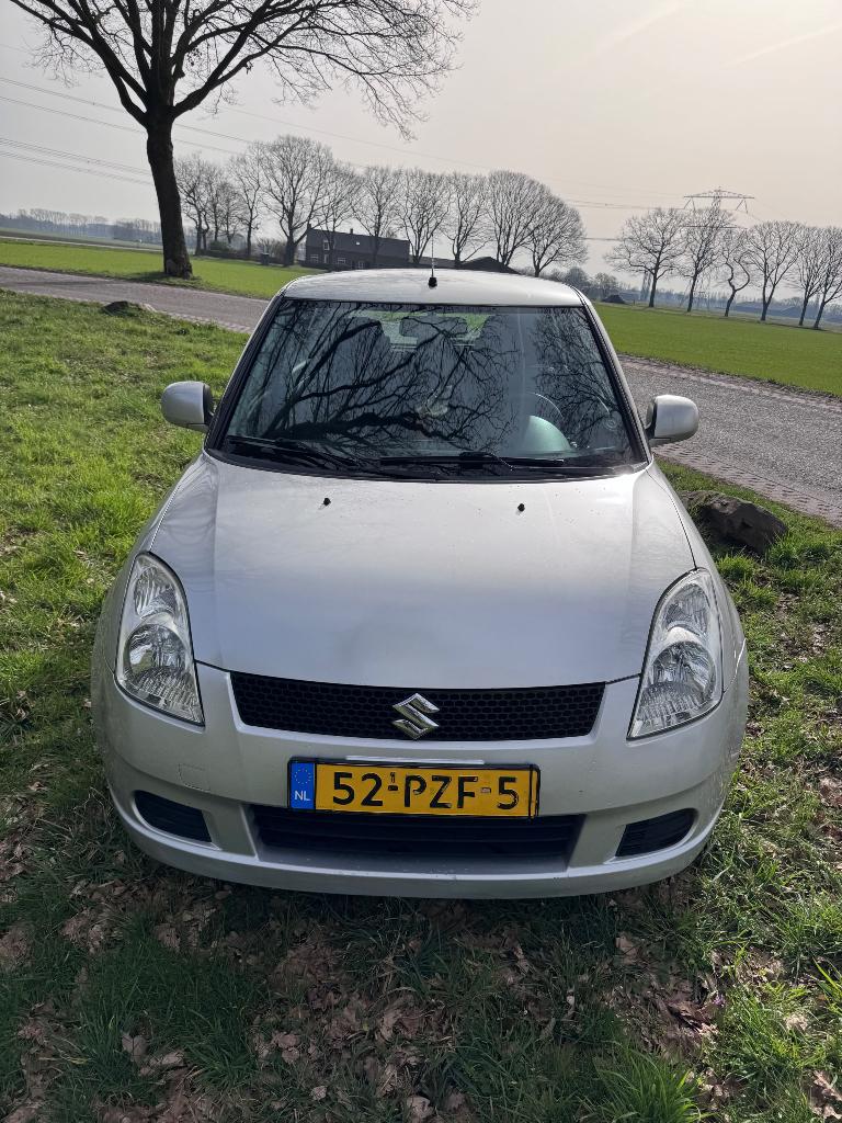 Suzuki Swift 1.3 5D 2007 Grijs, Auto's, Voorwielaandrijving, 40 €/maand, 965 kg, 400 kg
