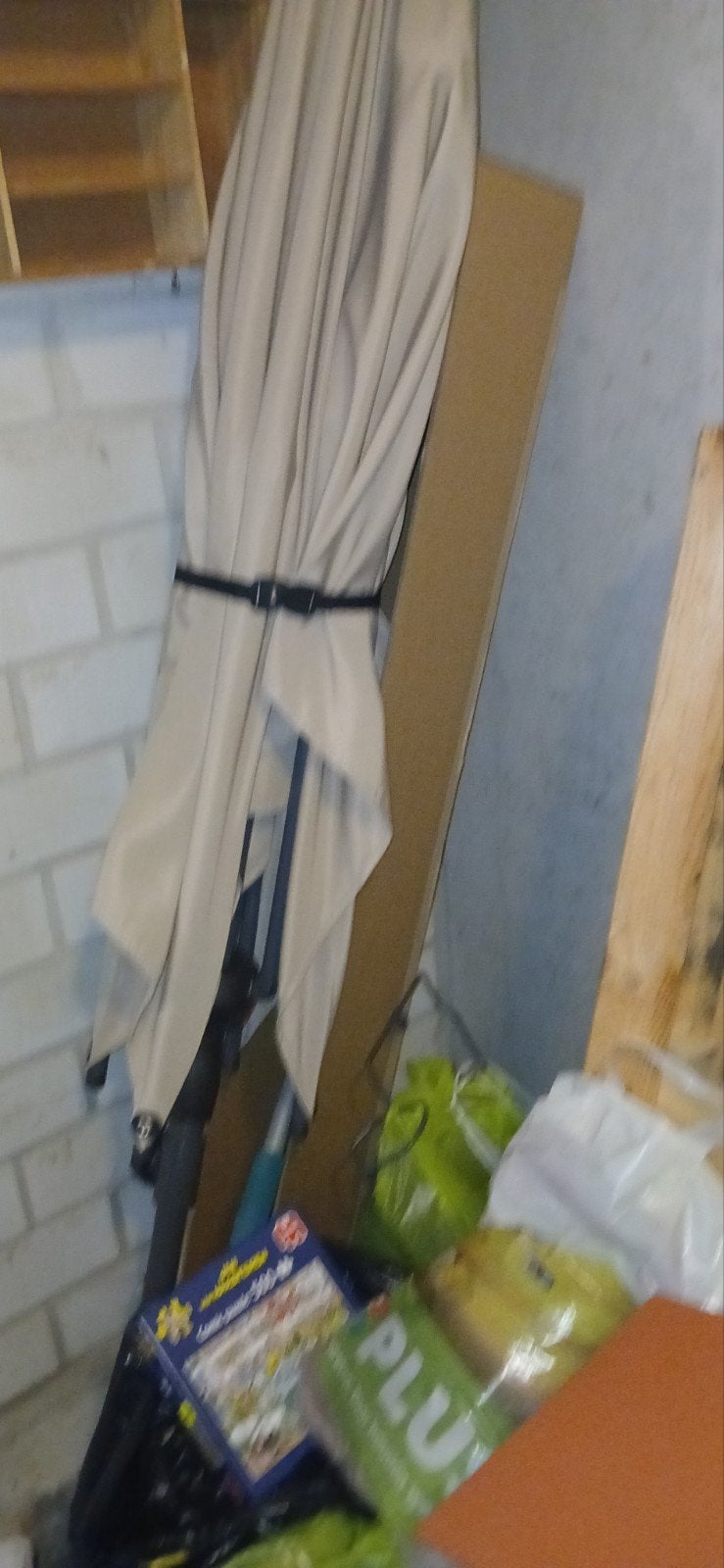 Beige parasol, opvouwbaar, Ophalen