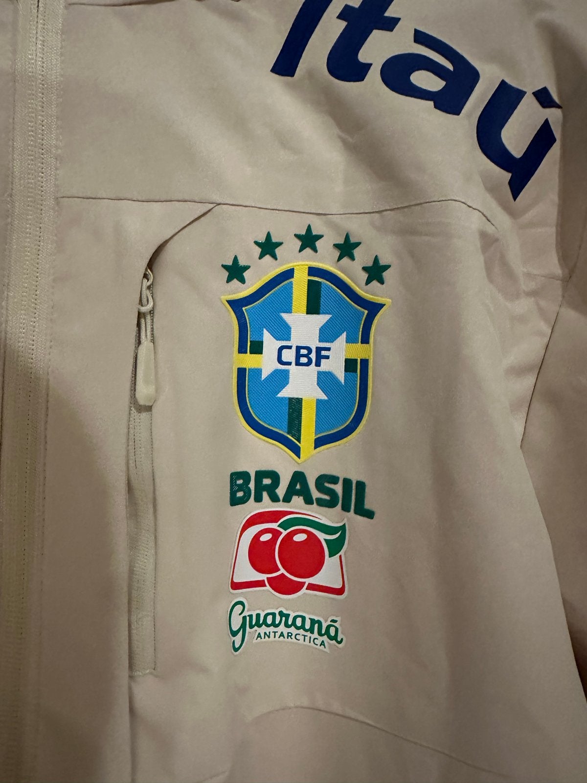 Nike Brazilië Windrunner Jas - Crème/Wit, Ophalen of Verzenden, Nieuw, Maat 56/58 (XL), Wit