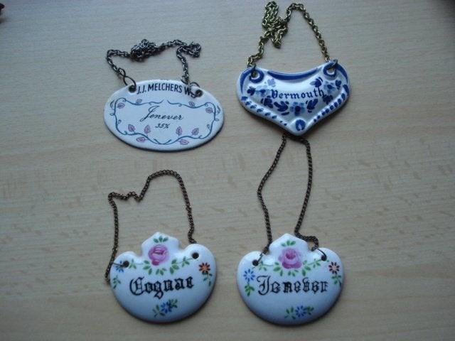 bar accessoires, keramische flessen schildjes, Ophalen of Verzenden, Gebruikt
