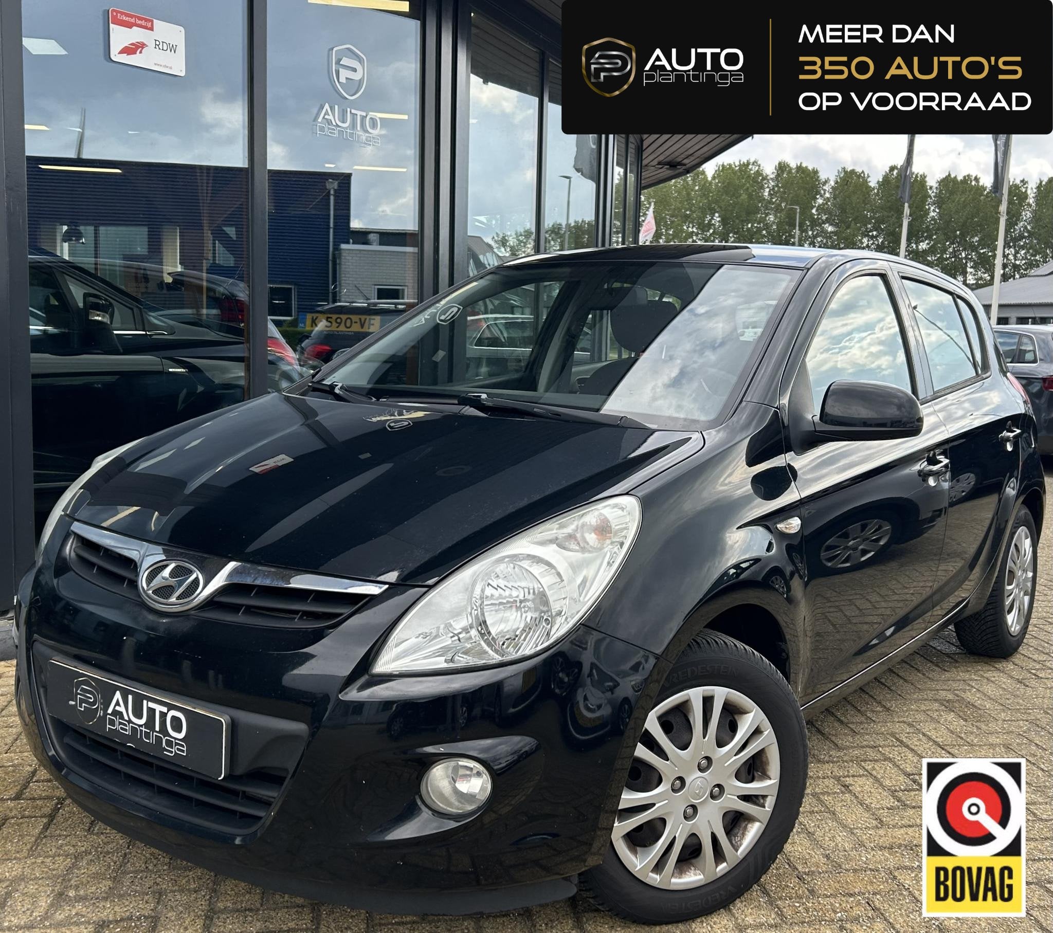 Hyundai i20 1.2i DynamicVersion 77PK | NL AUTO | Onderhoudsh, Auto's, Hyundai, Gebruikt, 31 €/maand, 4 cilinders, Zwart