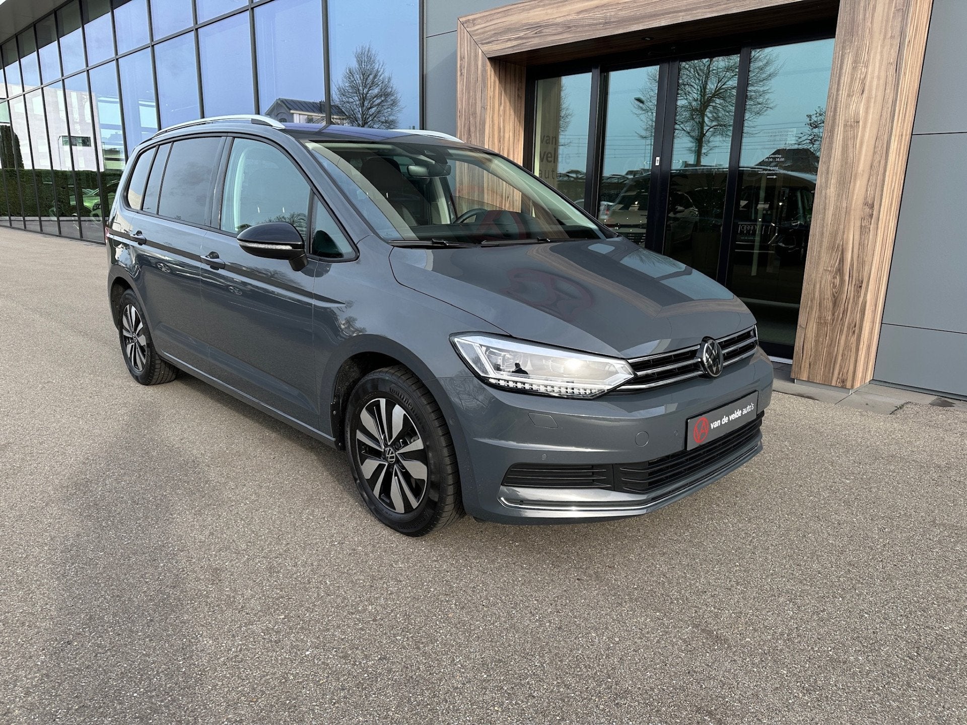 Volkswagen Touran 1.5 TSI 150pk DSG Goal 7-persoons | Trekha, Auto's, 12 maanden, Zwart, 4 cilinders, 1415 kg