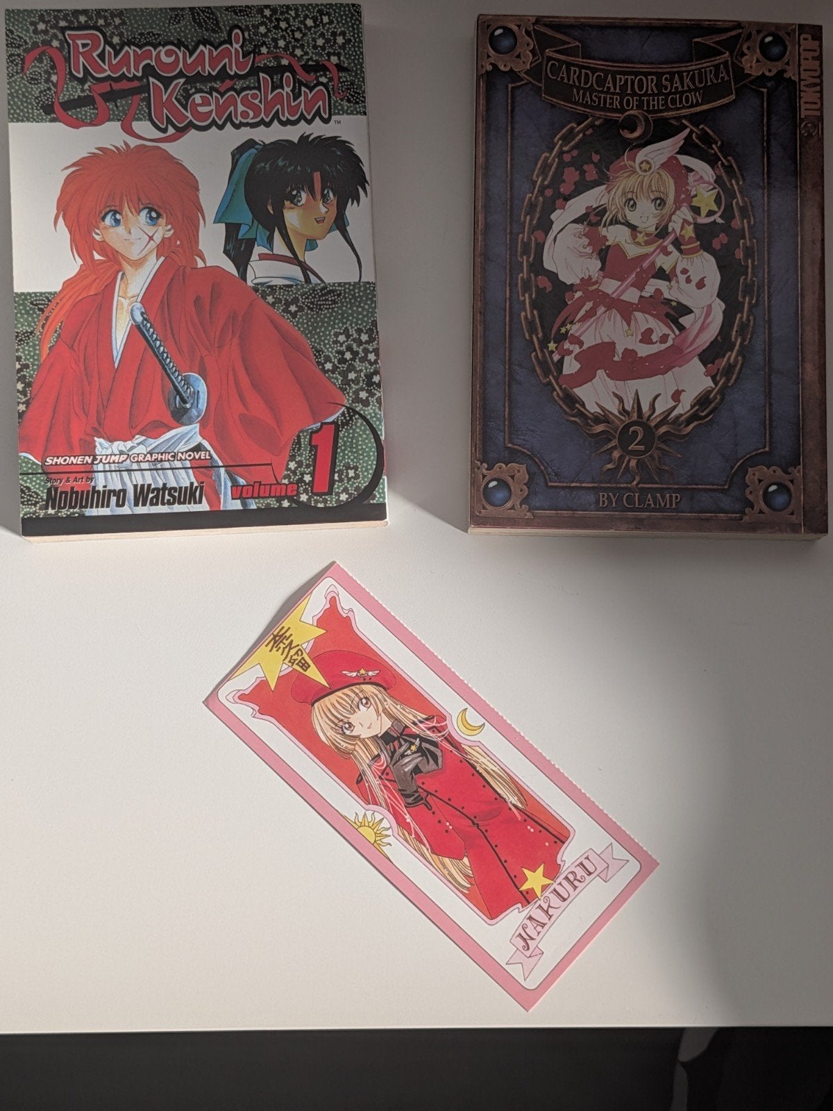 Manga: Rurouni Kenshin Vol. 1 & Cardcaptor Sakura Vol. 2, Meerdere stripboeken, Ophalen of Verzenden, Zo goed als nieuw, Nobuhiro Watsuki, CLAMP
