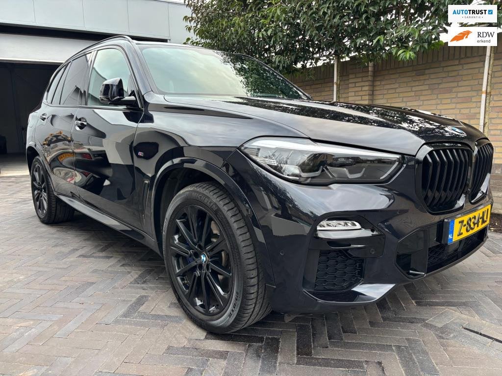 BMW X5 XDrive45e Carbon zwart M-pakket PANORAMA 394 pk, Auto's, Dealer onderhouden, Gebruikt, Zwart, Vierwielaandrijving