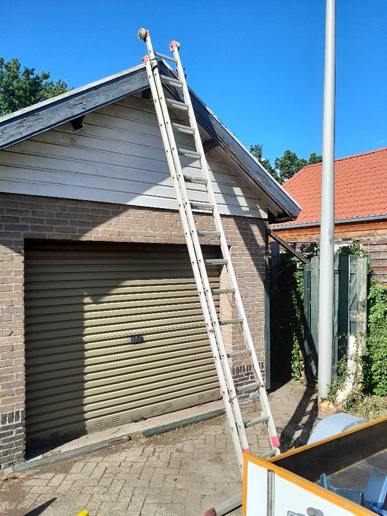 2 delige uitschuifbare ladder 14 tredes, 7m hoog., Doe-het-zelf en Verbouw, Ophalen, Gebruikt, Ladder, Opvouwbaar of Inschuifbaar