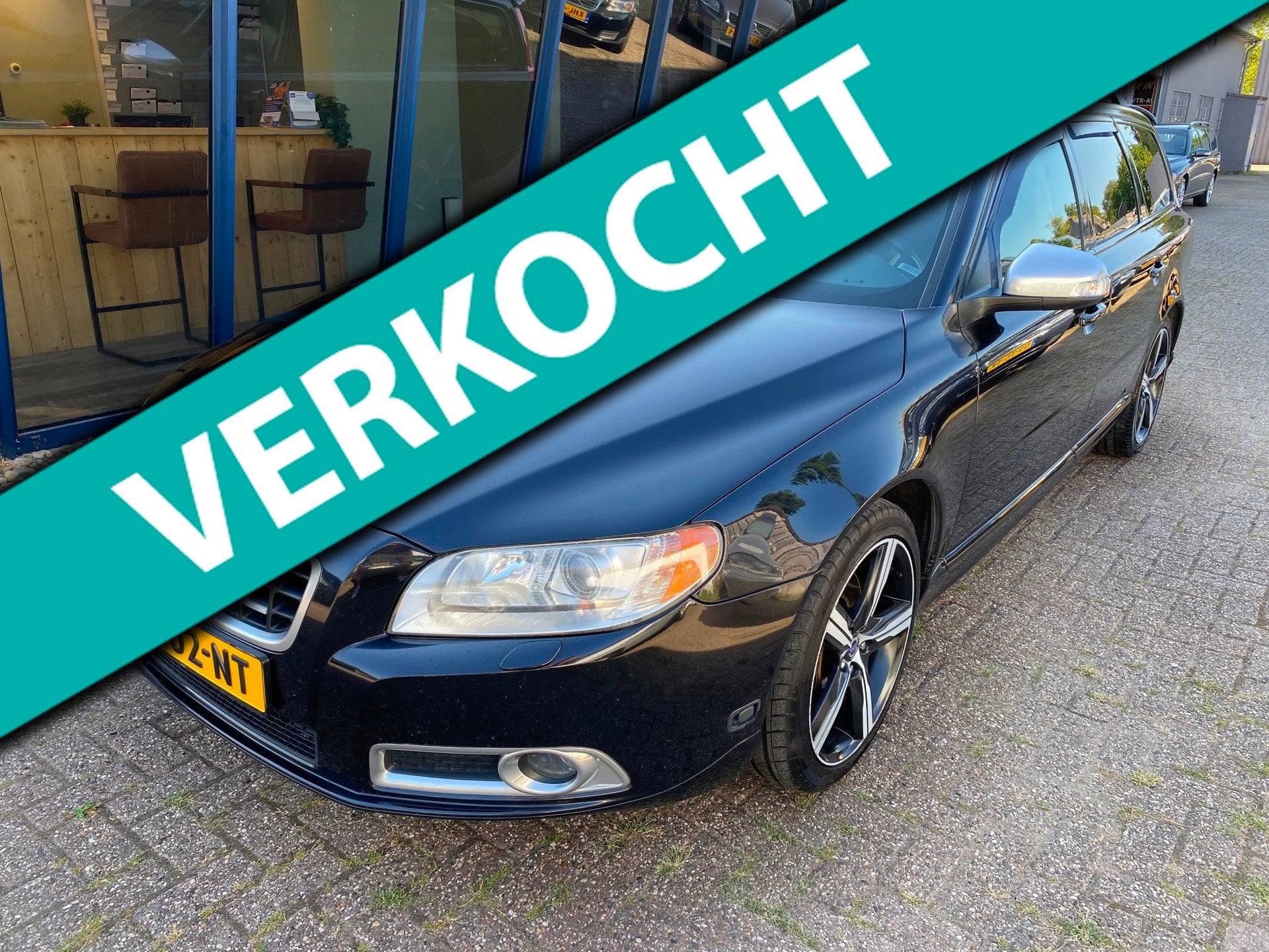 Volvo V70 2.5FT R-Design 230PK LEER / XENON / PDC / TREKHAAK, Auto's, Gebruikt, Zwart, Handgeschakeld, Automatische klimaatregeling