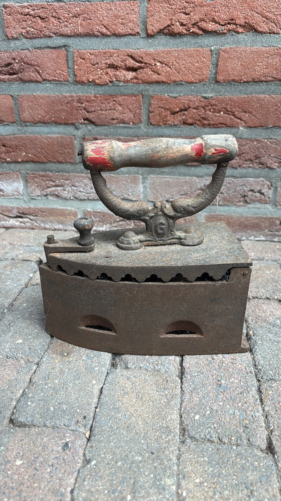 Antiek kolenstrijkijzer, Ophalen