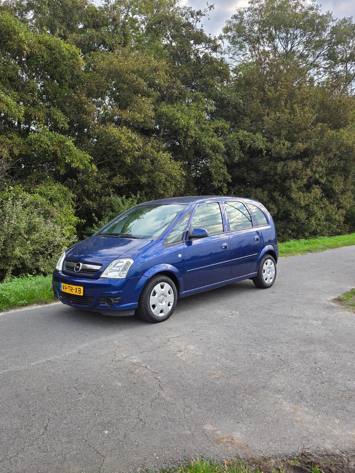 Opel Meriva 1.6 16V Airco,cruise,pdc etc, Auto's, Voorwielaandrijving, Euro 5, Verwarmde buitenspiegels, Zwart