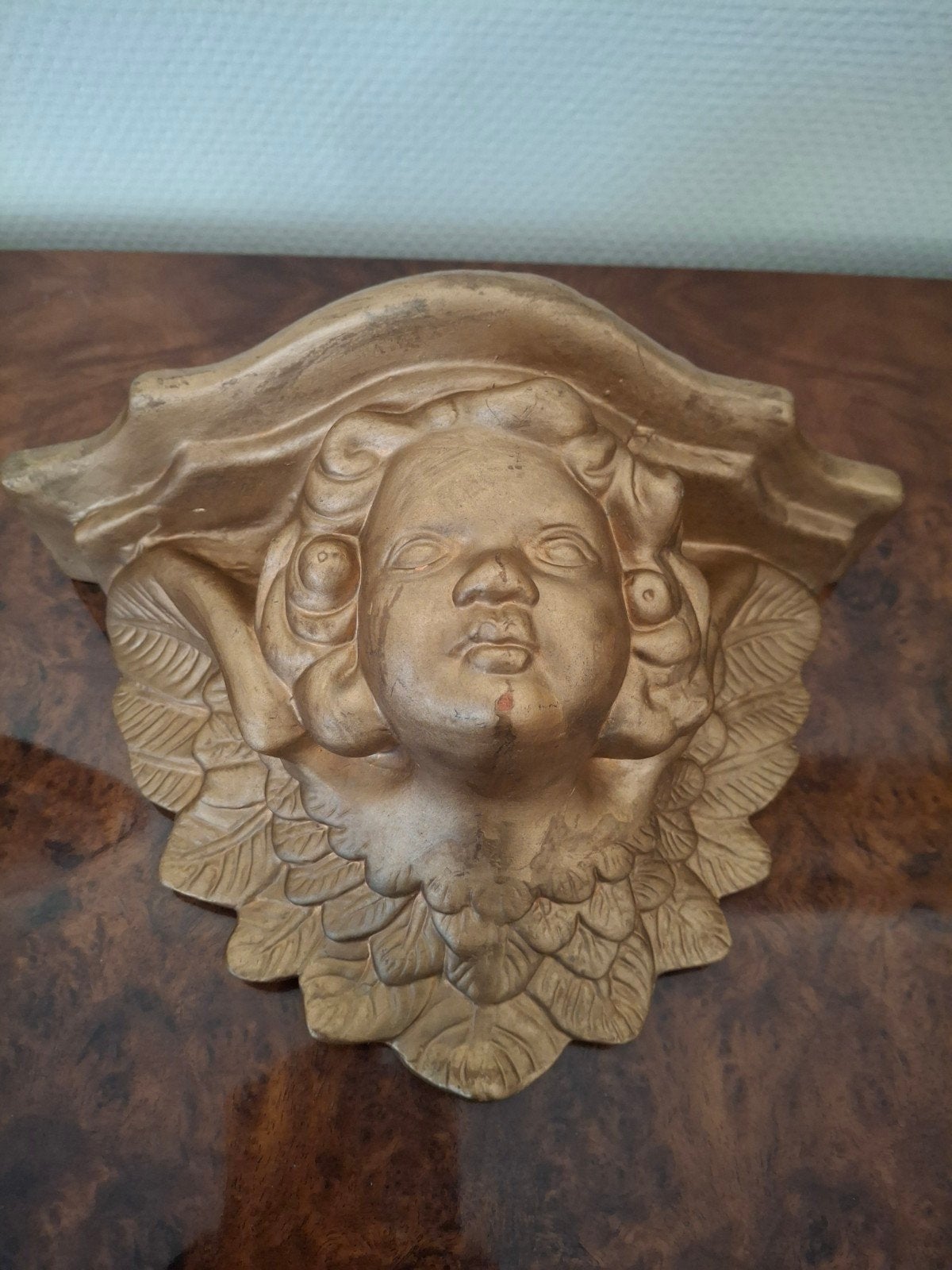 Terracotta console met cherubijn, goud geverfd, Ophalen of Verzenden