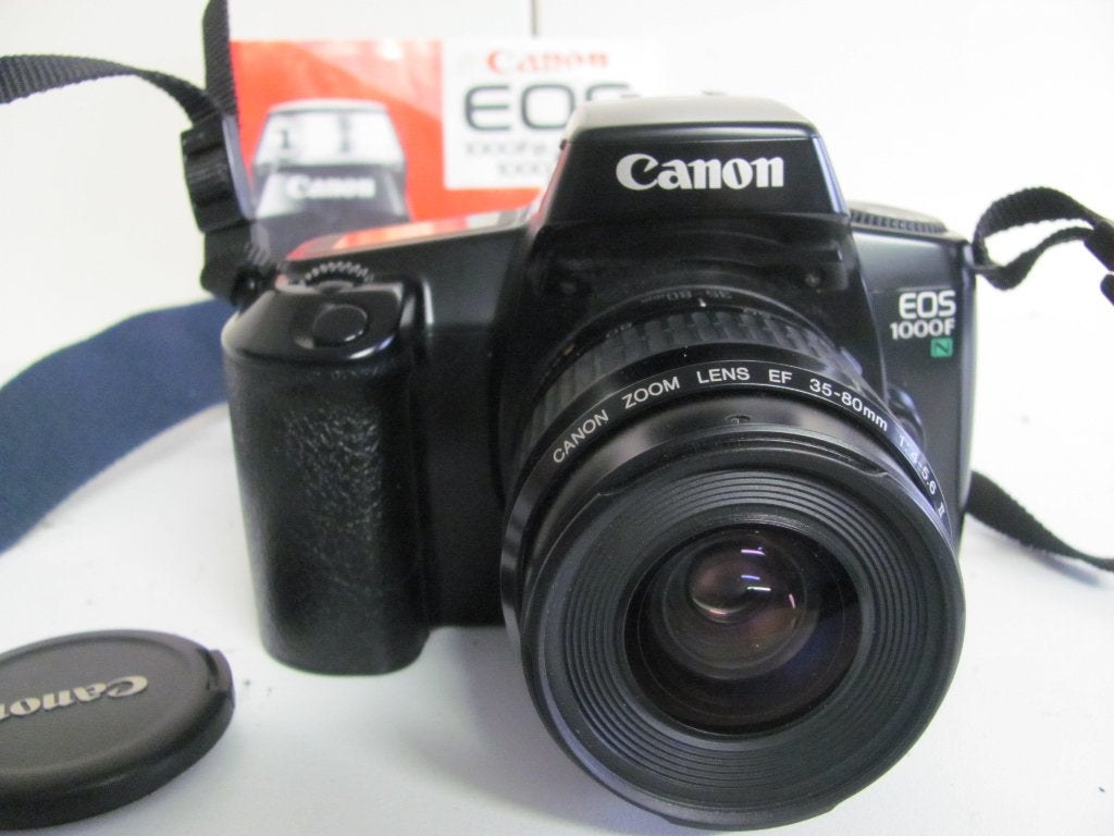 CANON EOS 1000FN met 35-80mm lens draagriem, Audio, Tv en Foto, Fotocamera's Analoog, Ophalen of Verzenden, Zo goed als nieuw