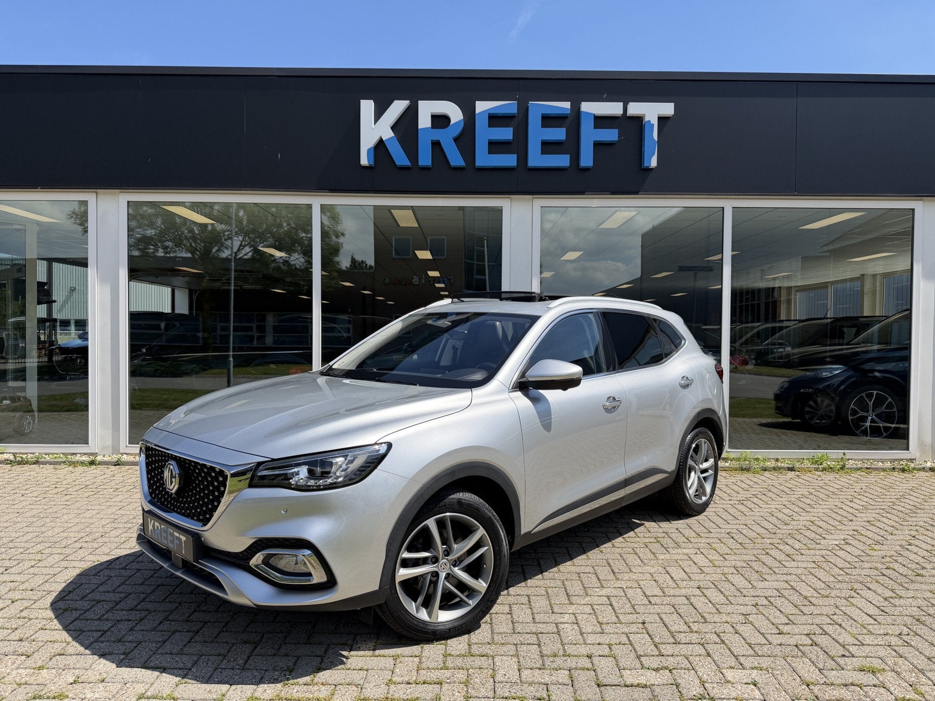MG EHS 1.5 TGDI Luxury Schuifdak (bj 2023, automaat), Auto's, 12 maanden, Gebruikt, 4 cilinders, Leder
