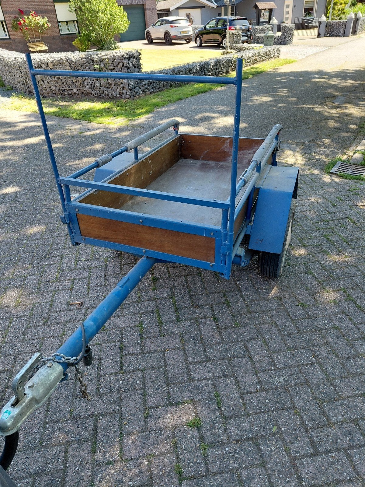 Kleine aanhangwagen., Ophalen