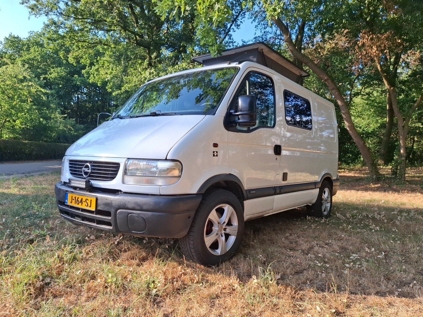 Opel movano 1.9dti 2004 camperbus met hefdak, Auto's, 2000 kg, 7 stoelen, Wit, Origineel Nederlands