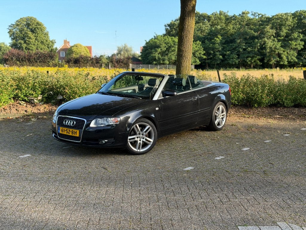 Audi A4 2.0 Tfsi 200PK Cabrio AUT 2006 Zwart, Auto's, Zwart, 4 cilinders, 4 stoelen, A4