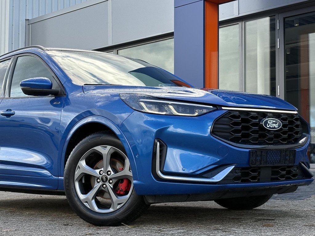 Ford Kuga 2.5 FHEV ST-Line X 190pk | Driver Assistance Pack, Auto's, Ford, 14 kWh, Gebruikt, Blauw, Leder en Stof