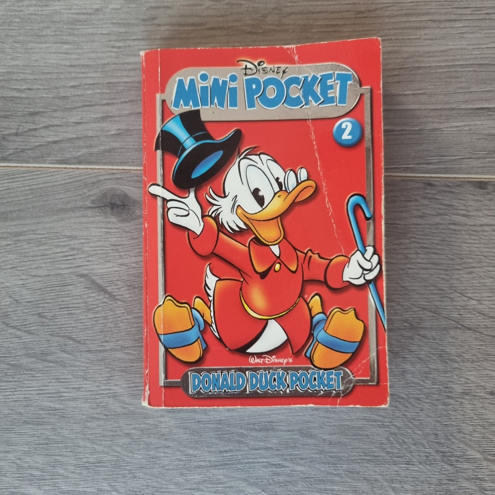 Donald Duck Mini Pocket 2 – Oom Dagobert stripboek, Eén stripboek, Ophalen of Verzenden, Gelezen, Sanoma Media