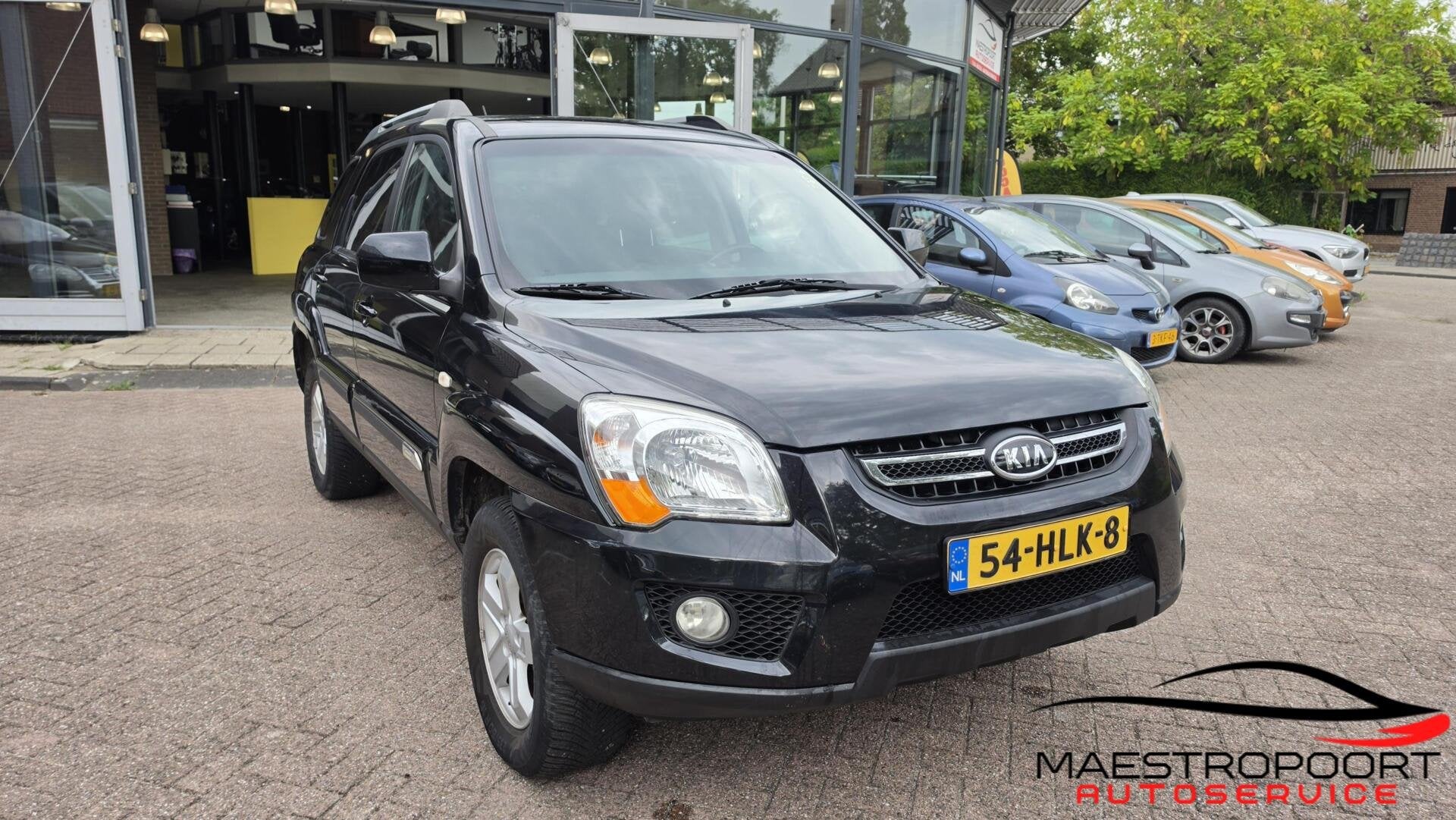 Kia Sportage 2.0 CVVT X-clusive, Auto's, 1442 kg, Gebruikt, Zwart, Origineel Nederlands