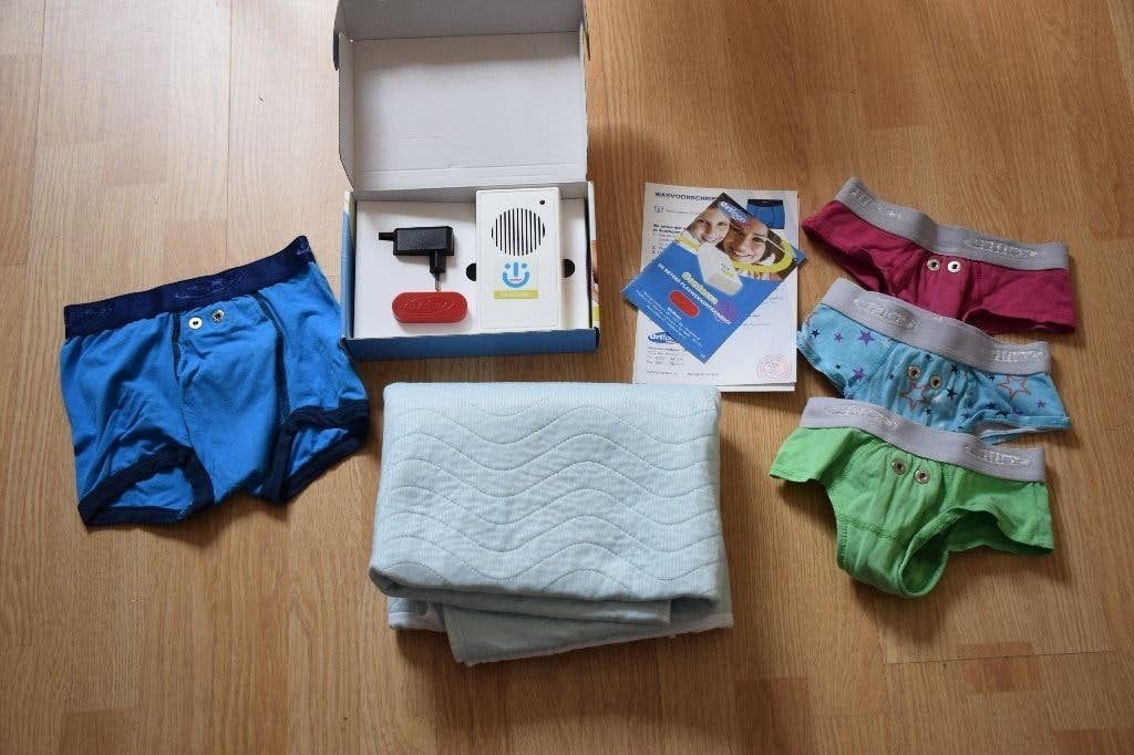 Uriflex Contessa plaswekker met broekjes en bed-onderlegger, Kinderen en Baby's, Overige Kinderen en Baby's, Ophalen of Verzenden
