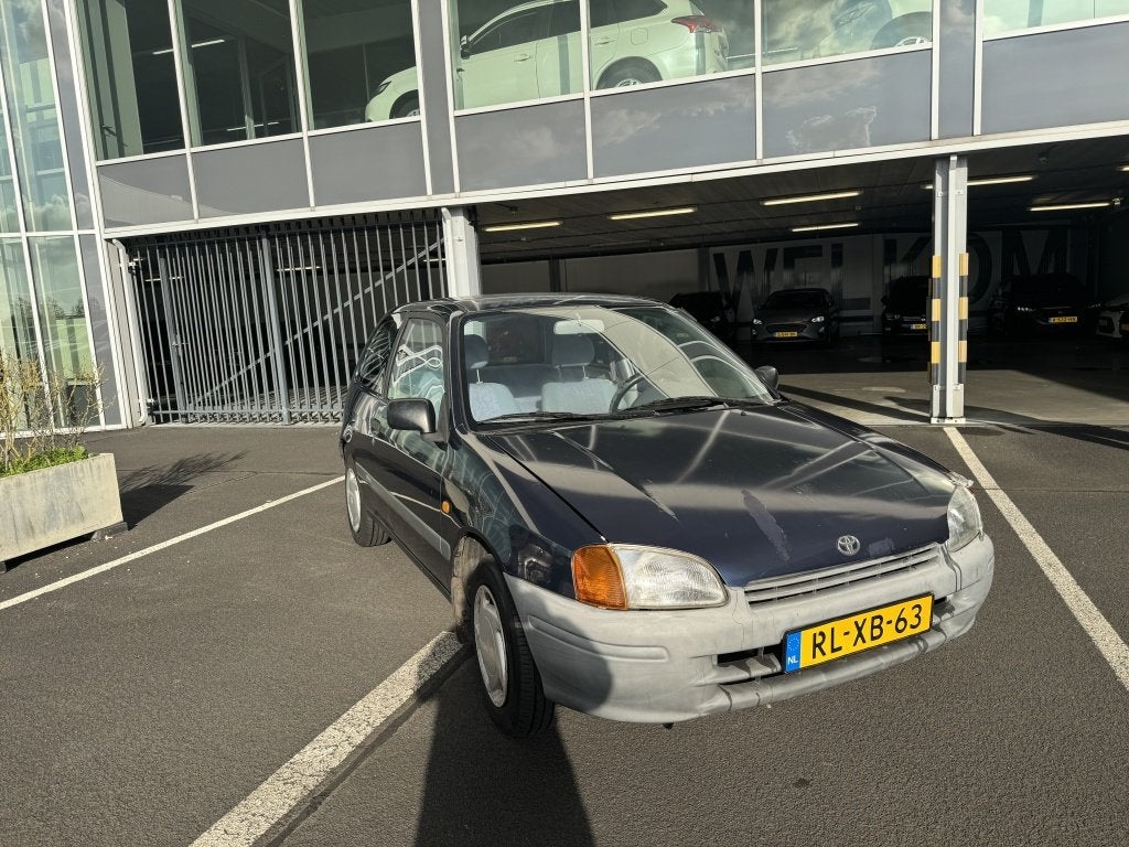 Toyota Starlet 1.3-16V, Auto's, Blauw, Origineel Nederlands, Bedrijf, Handgeschakeld