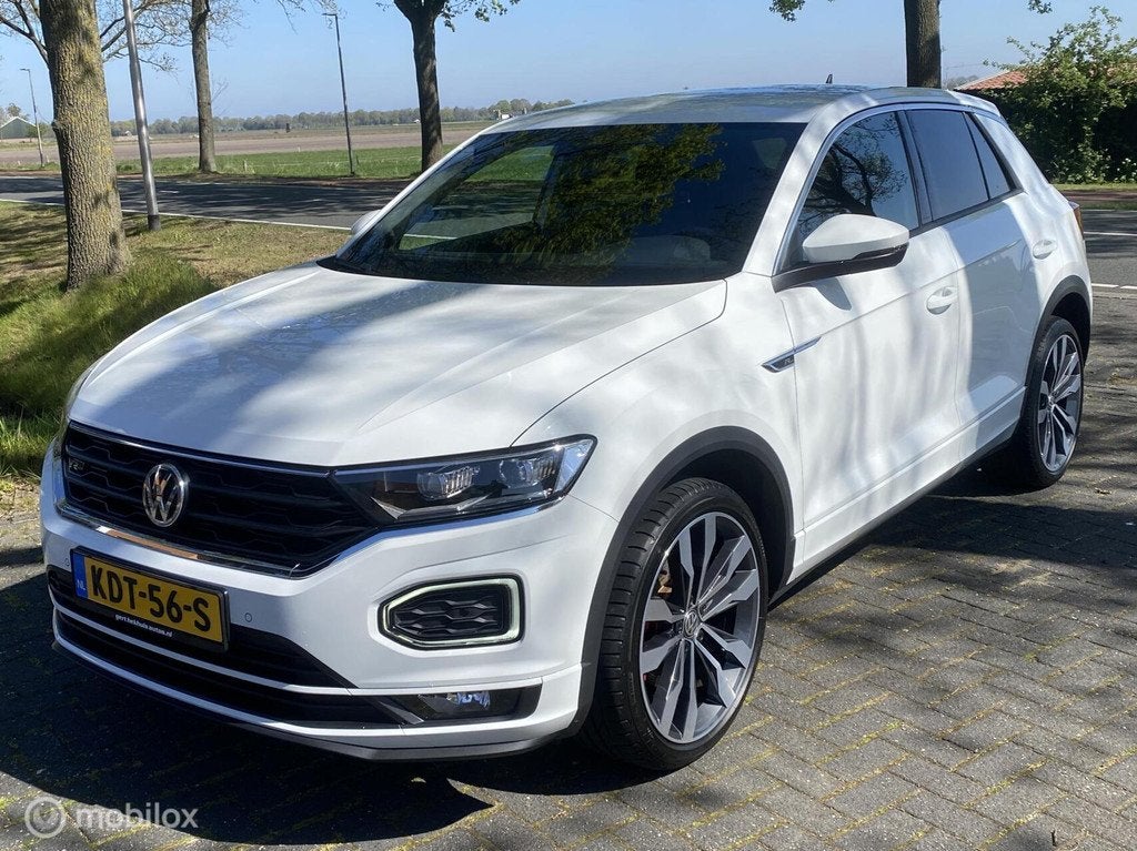 Volkswagen T-Roc 1.5 TSI Sport I 3 X R Line I LED I 19 Inch, Stof, Zwart, 4 cilinders, 150 pk
