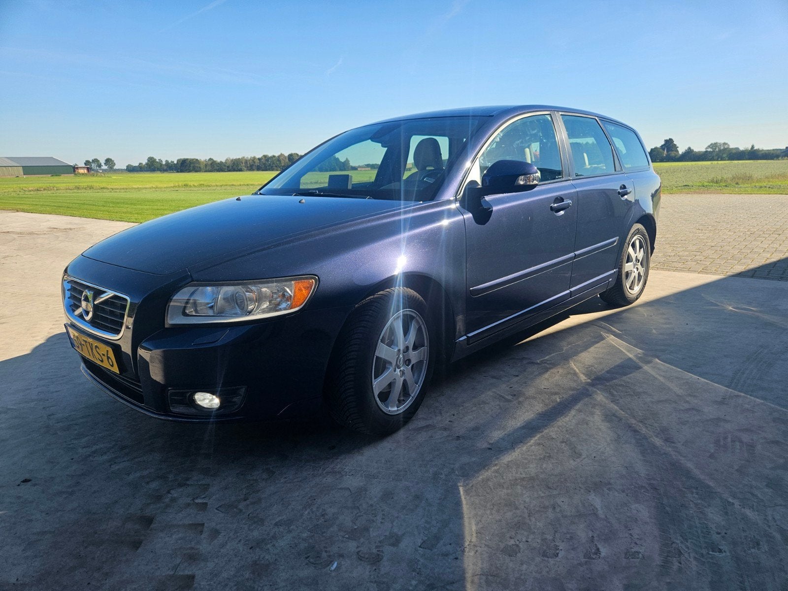 Volvo V50 D2 Drive 115pk Start/stop 2012 Blauw, Auto's, Voorwielaandrijving, Beige, 4 cilinders, 1290 kg
