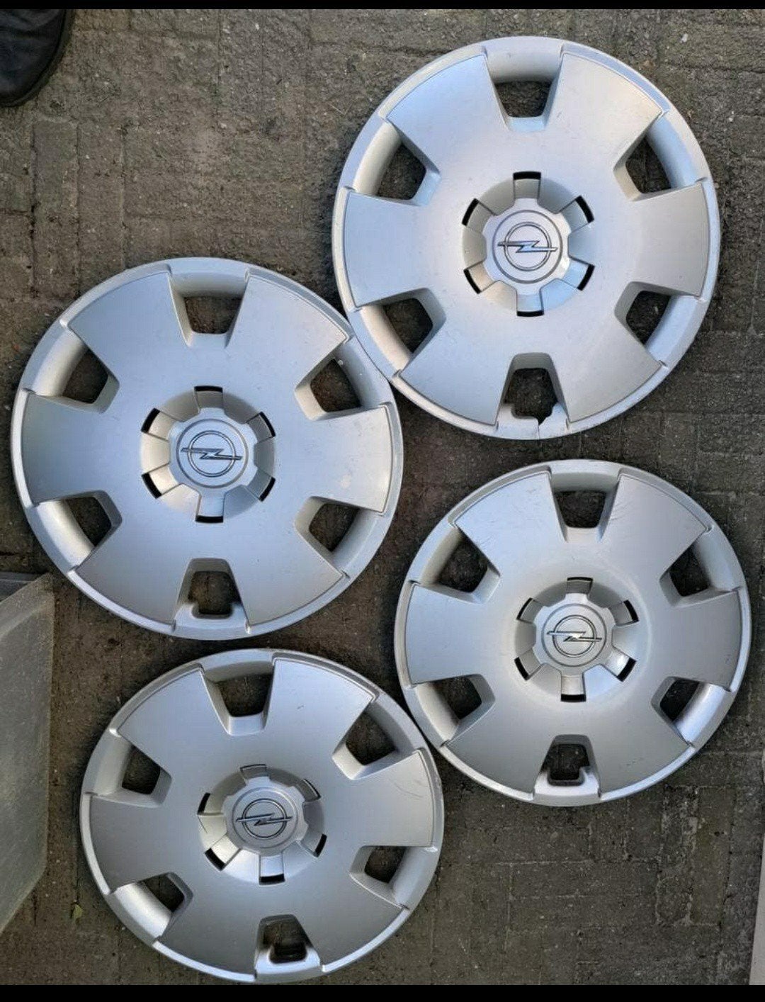 Wieldop Opel,Set,4,embleem,kunststof,grijs,buitenmaat 44 cm, Auto diversen, Wieldoppen, Ophalen of Verzenden, Zo goed als nieuw