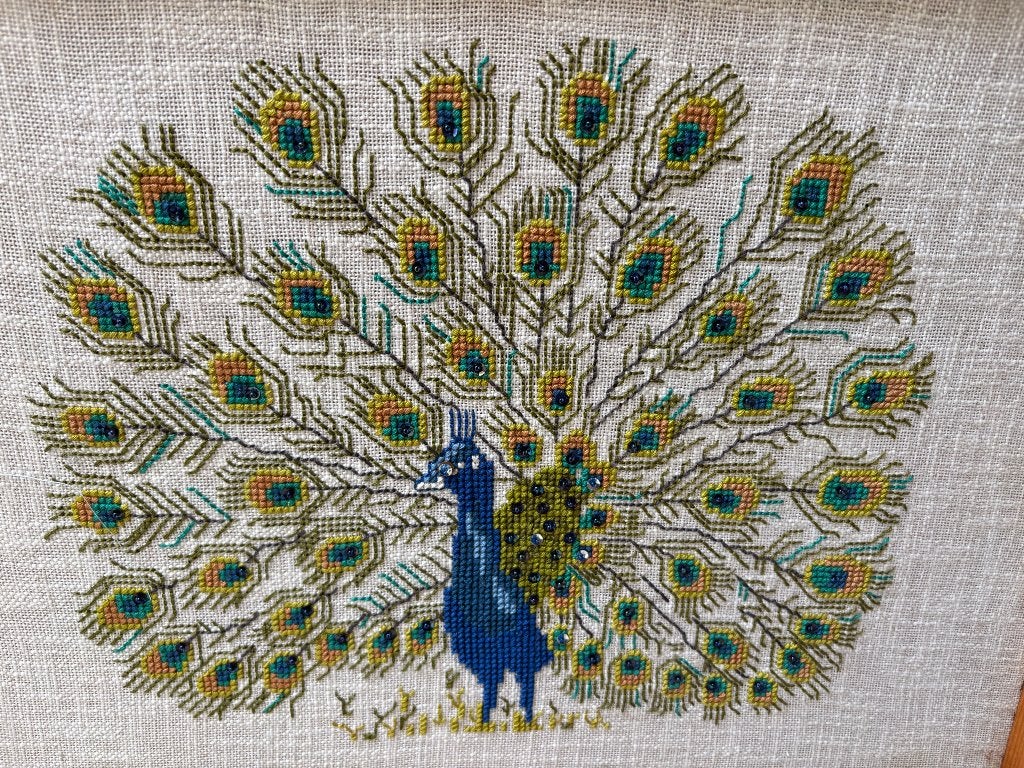 Borduursel Pauw, Ophalen