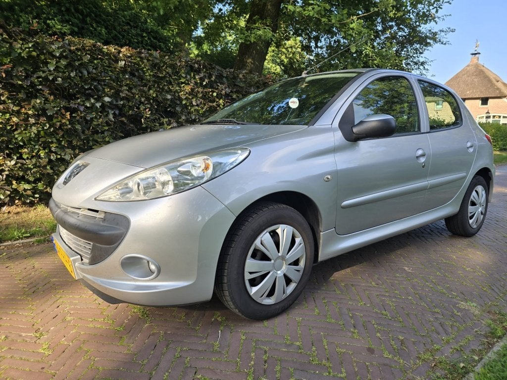 Peugeot 206+ 1.4 XS (bj 2011), Auto's, Peugeot, 504 kg, Stof, 4 cilinders, Origineel Nederlands