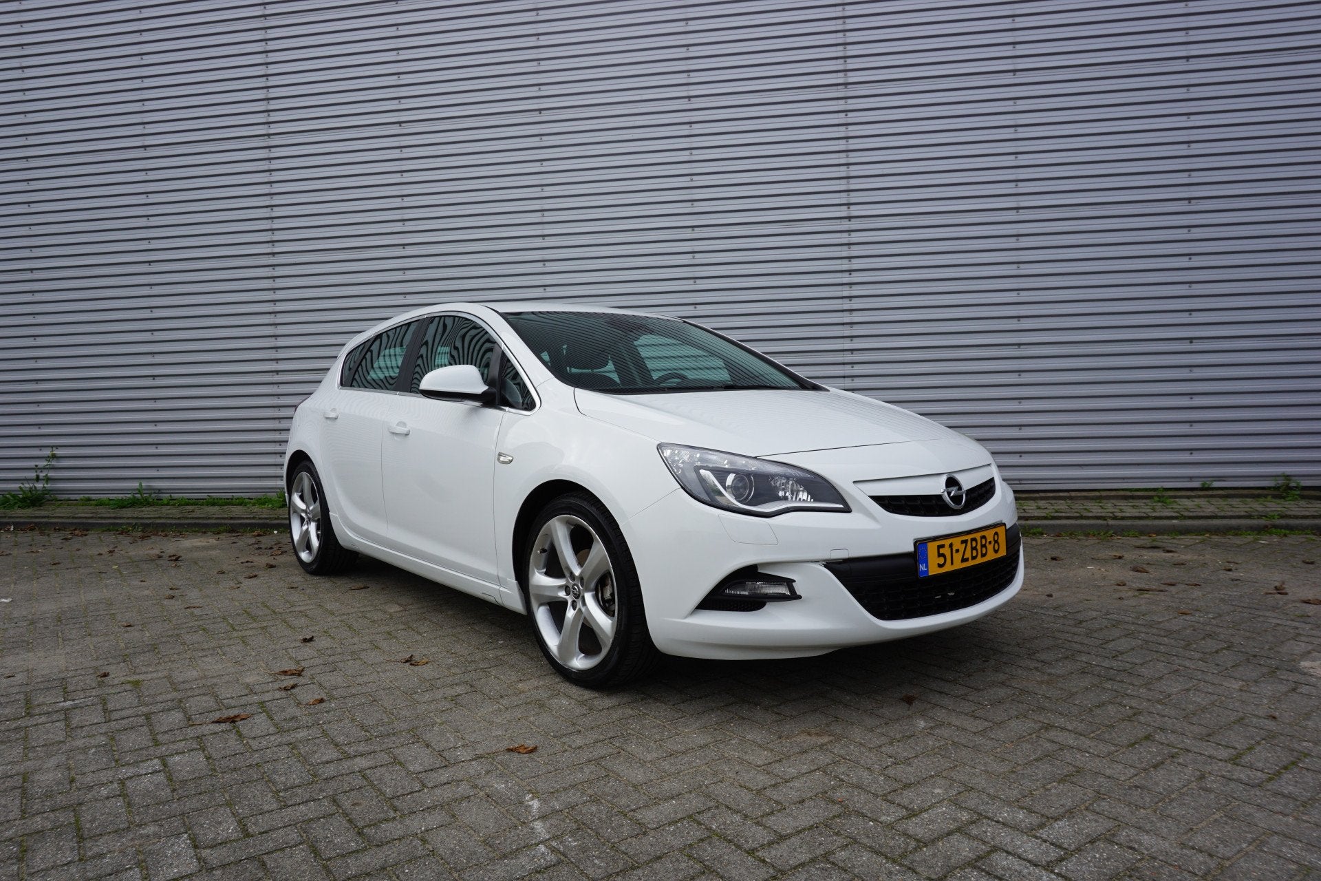 Opel Astra 1.4 Turbo GT Airco / Navi / Cruise / Parkeers / E, Auto's, Voorwielaandrijving, Euro 5, Stof, Gebruikt