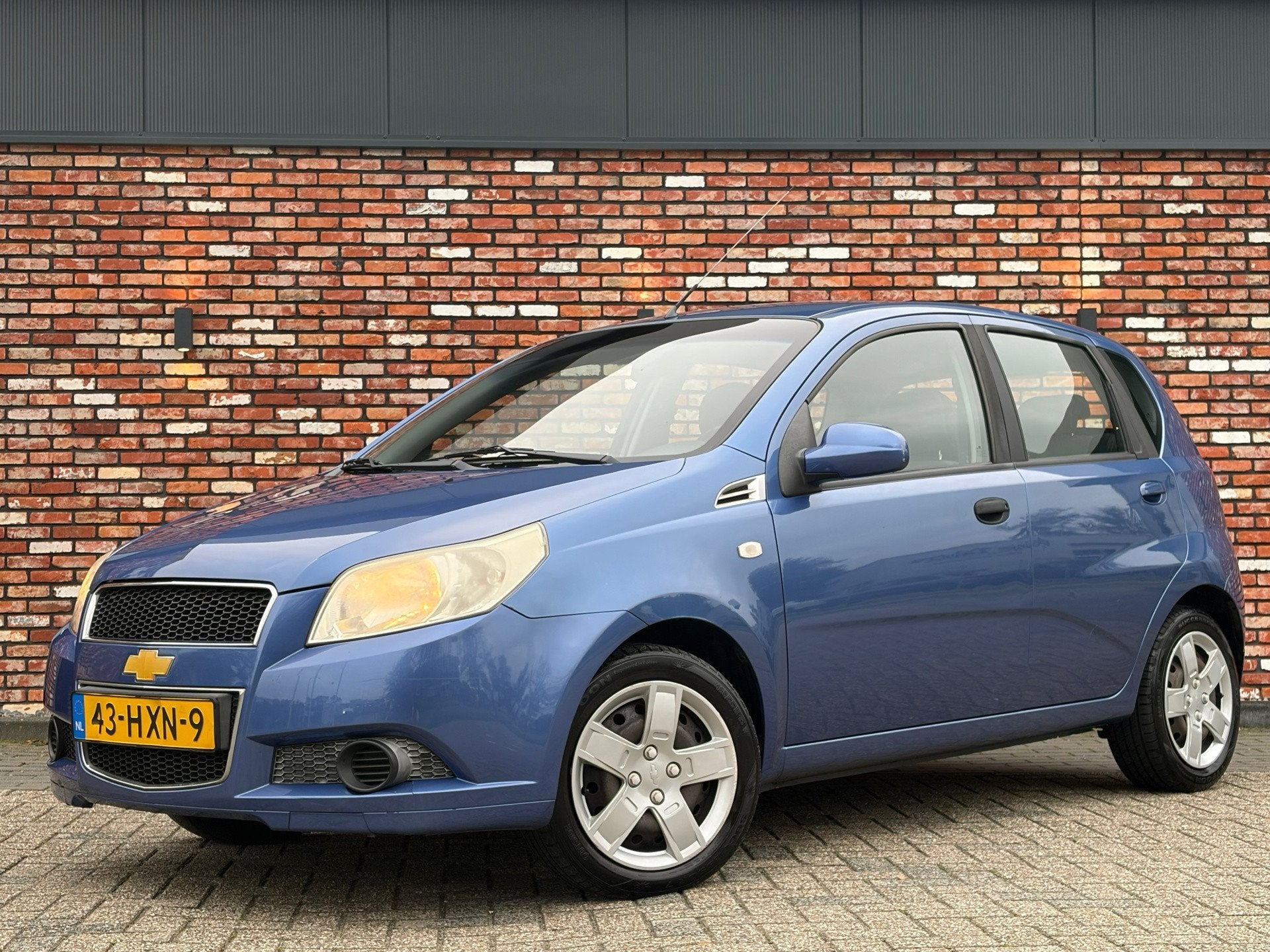 Chevrolet Aveo 1.2 16V LS 5-Deurs Airco Elek.Pakket OrigNL 1, Auto's, Voorwielaandrijving, Stof, 4 cilinders, Origineel Nederlands