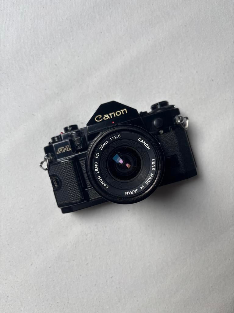 Canon A-1 spiegelreflexcamera met FD 28mm f/2.8 SC lens, Audio, Tv en Foto, Fotocamera's Analoog, Ophalen of Verzenden, Gebruikt