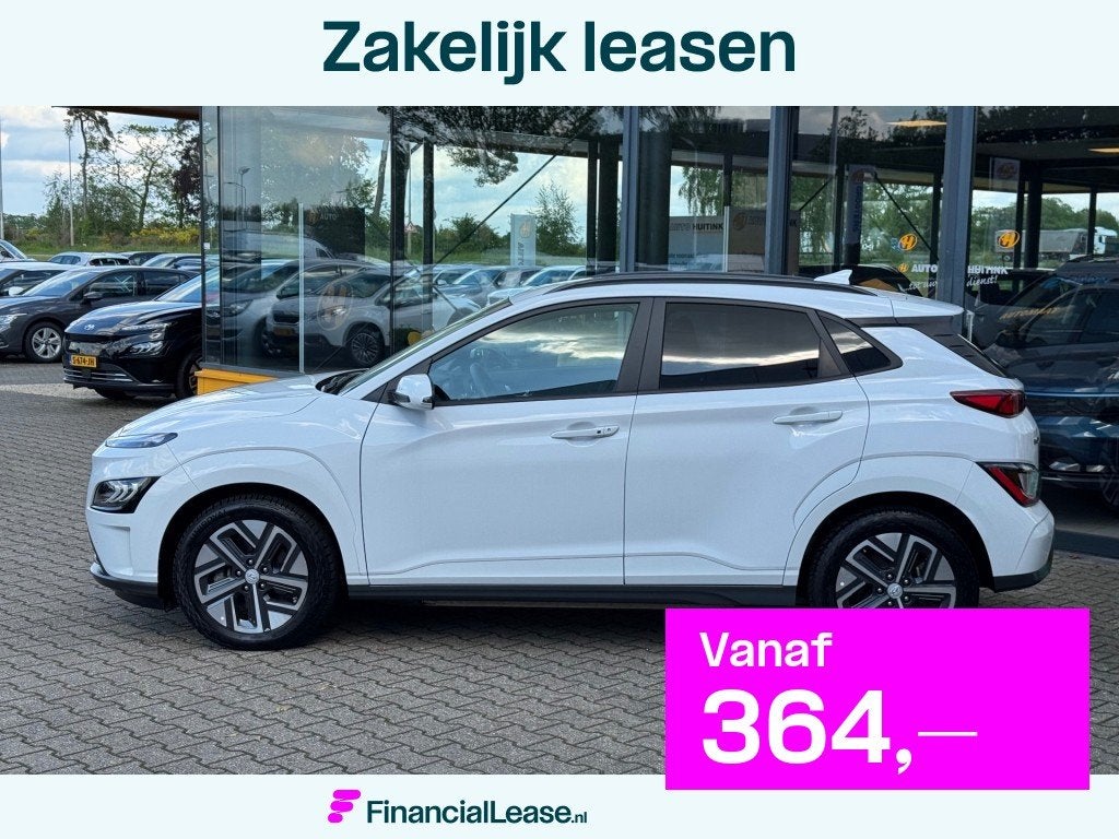Hyundai Kona EV 64kWh Premium - Navi - camera - stoel/stuur, 12 maanden, 14 kWh, Gebruikt, Wit