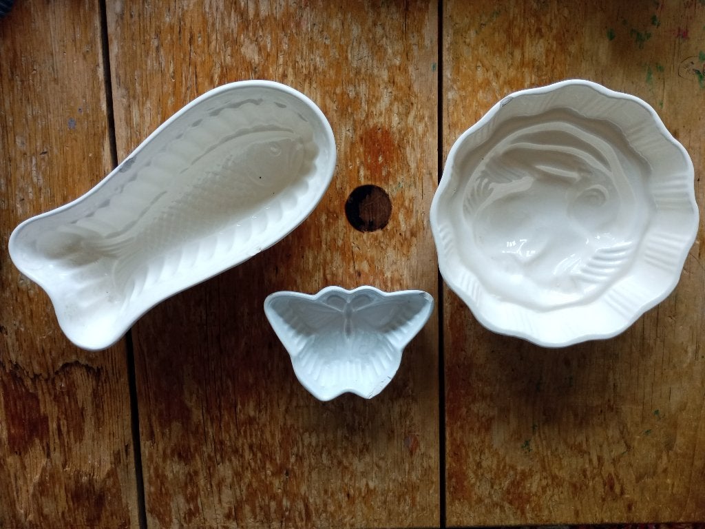 Puddingvormen licht beschadigd, Ophalen