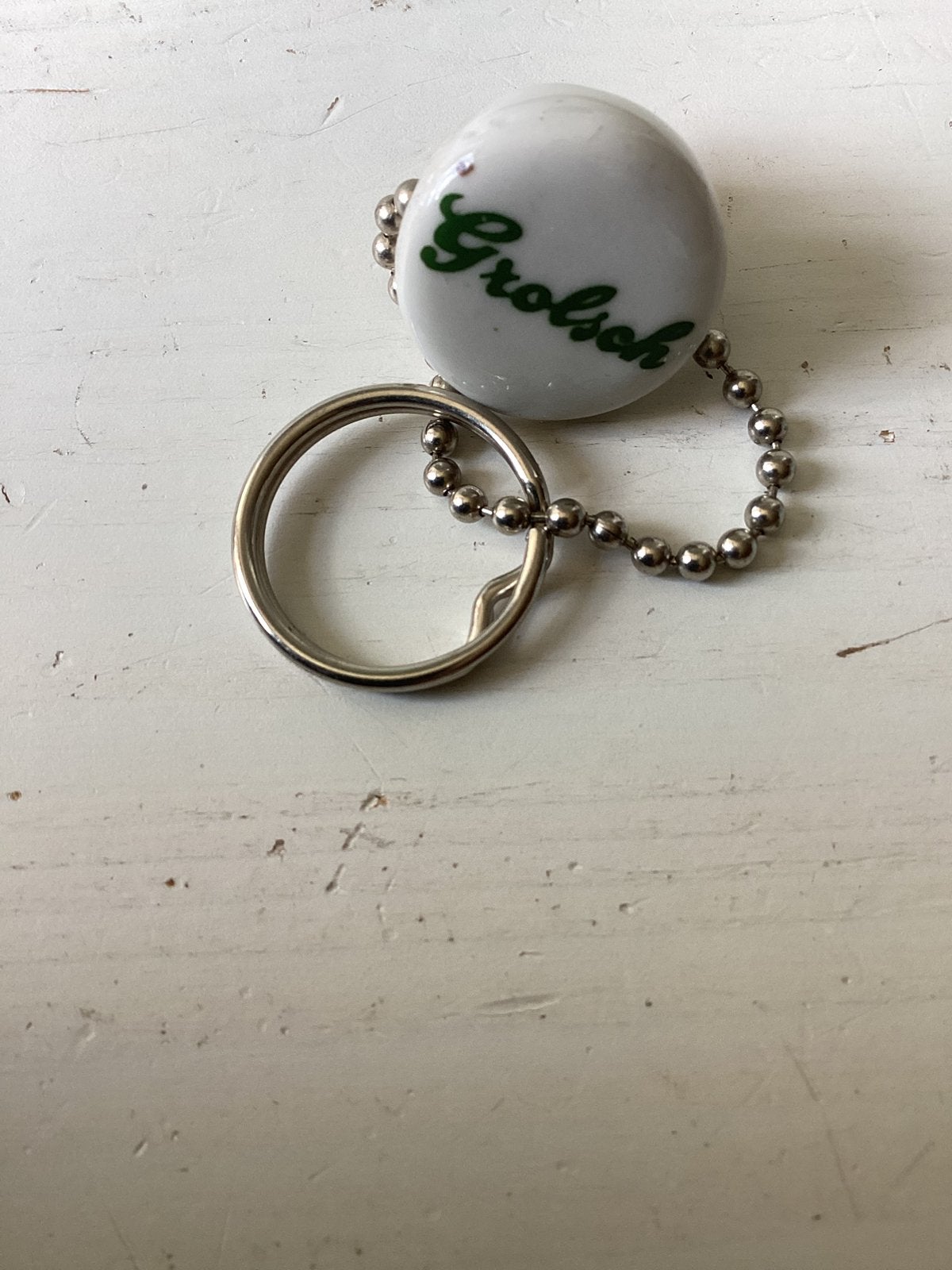 Sleutelhanger Grolsch, Verzamelen, Verzenden, Zo goed als nieuw, Overige typen, Grolsch