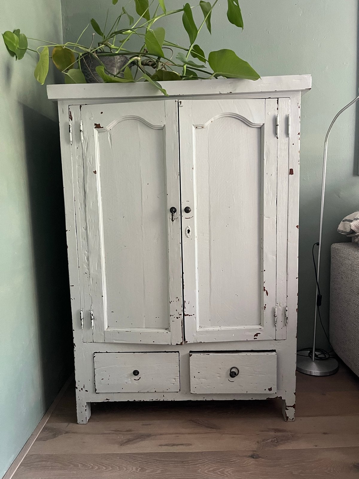 Antieke houten kast, Ophalen