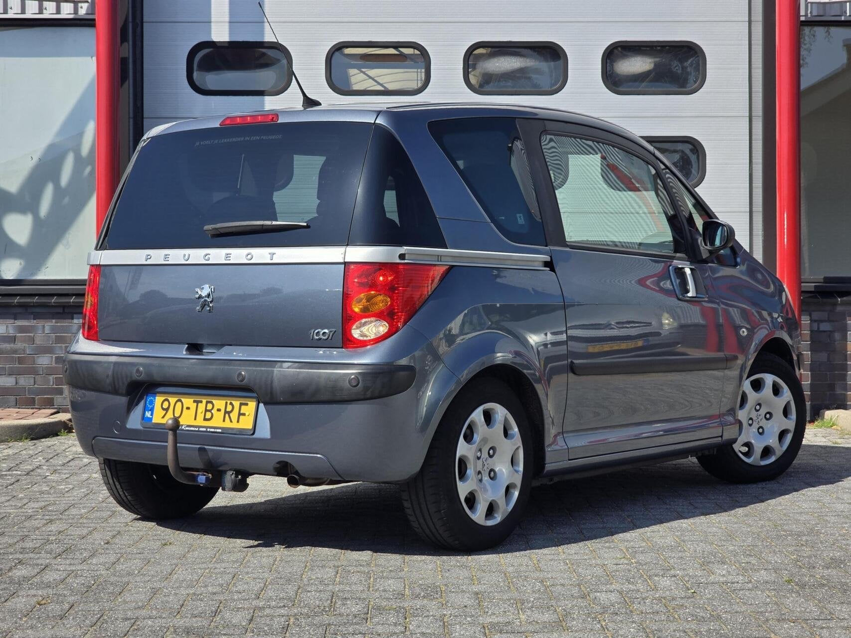Peugeot 1007 1.6-16V Sesam Sporty Airco/Trekhaak/PDC/Cruise, Auto's, Peugeot, Gebruikt, 4 cilinders, 4 stoelen, Parkeersensor