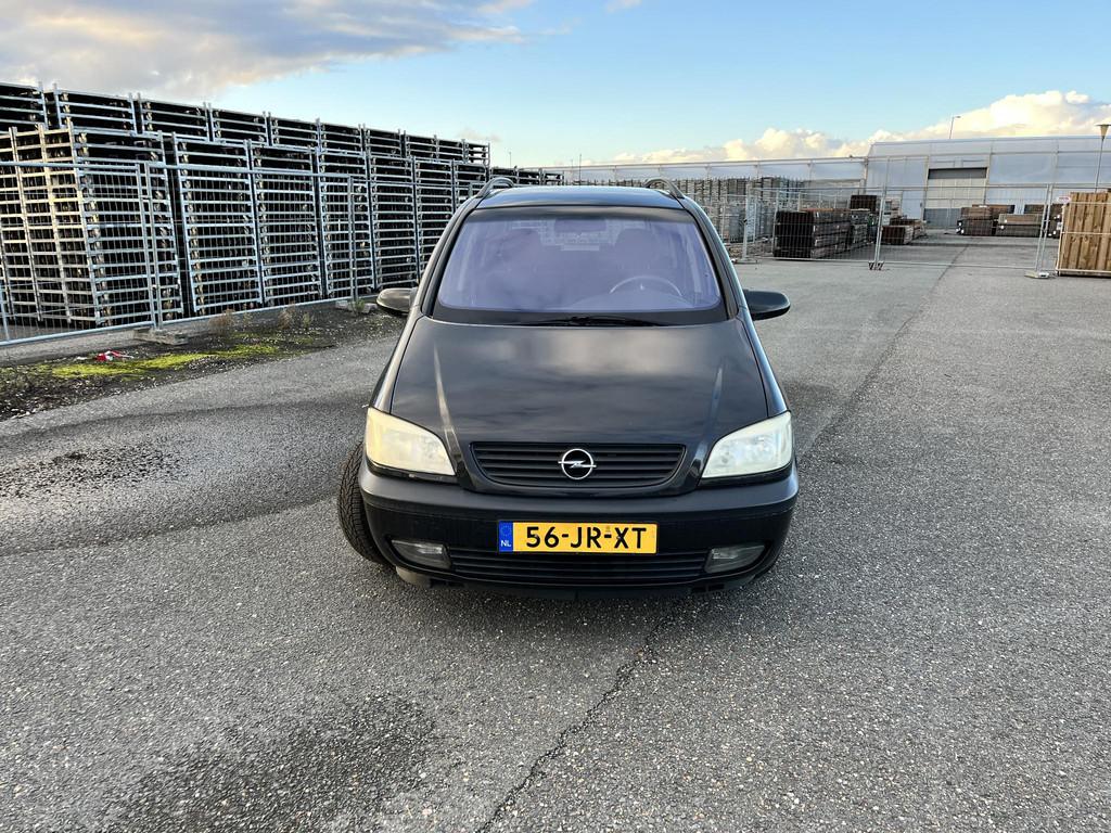 Opel Zafira 1.6-16V Comfort, Auto's, Gebruikt, 4 cilinders, 7 stoelen, Zwart