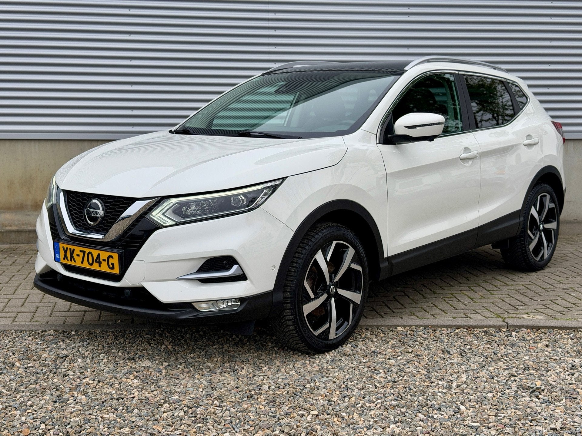 Nissan Qashqai 116pk Tekna + [ 1e eig. 27810 km ], Auto's, Voorwielaandrijving, Gebruikt, 4 cilinders, Wit